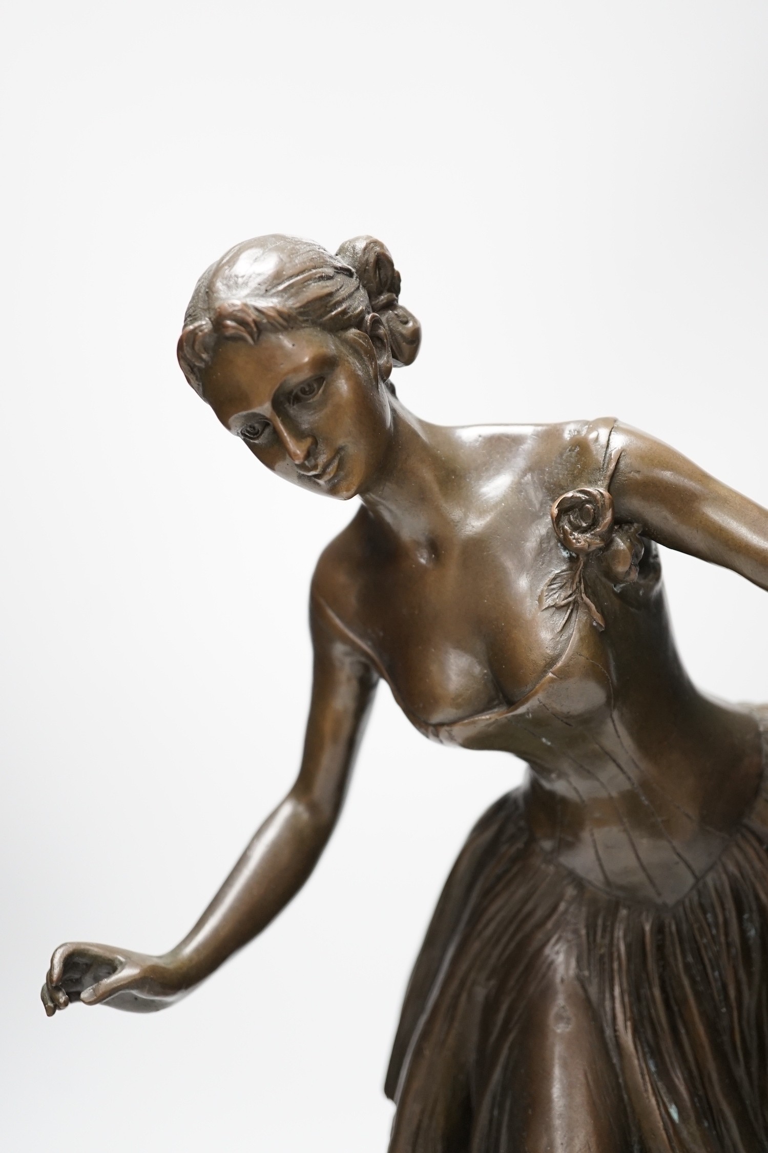 A bronze figure of a ballerina, signed, 40cm tall